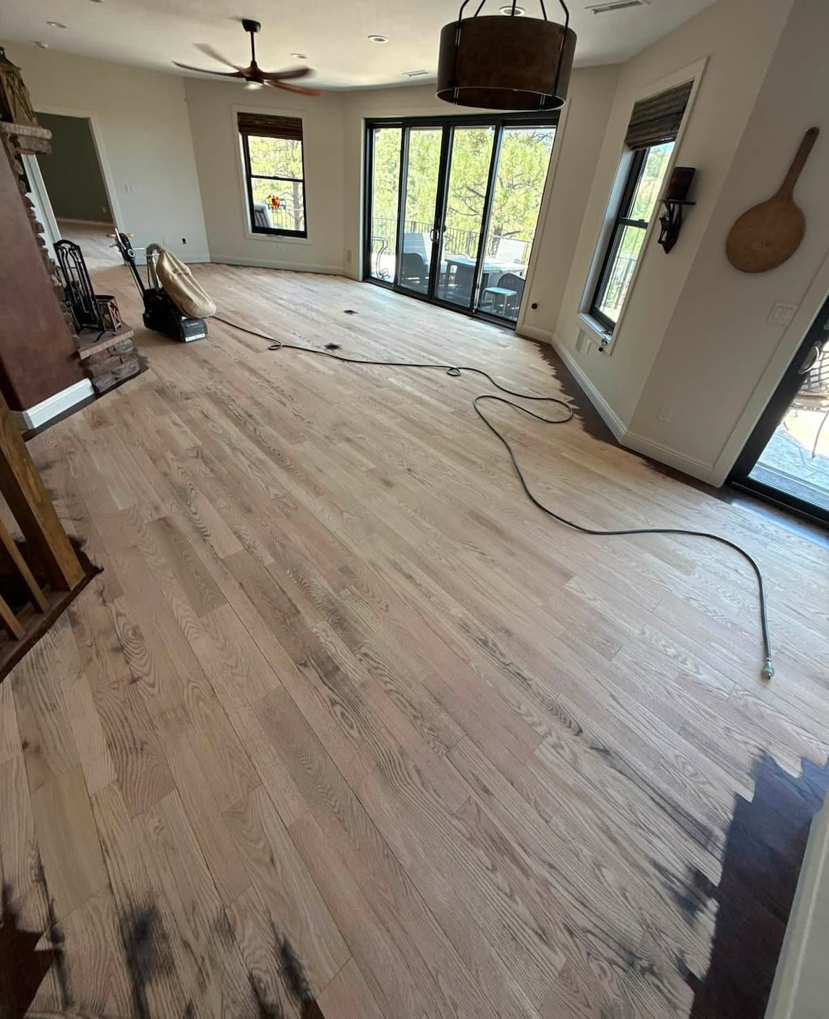 Sanding a hardwood floor for refinishing