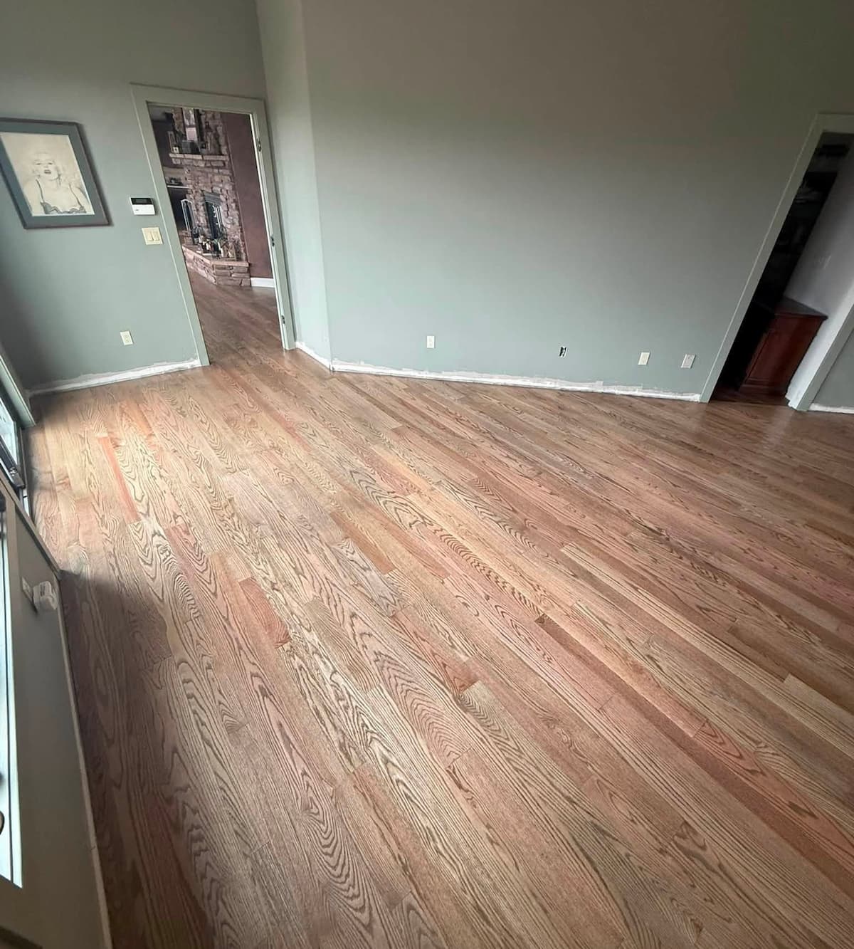 Sanded hardwood flooring ready for finishing